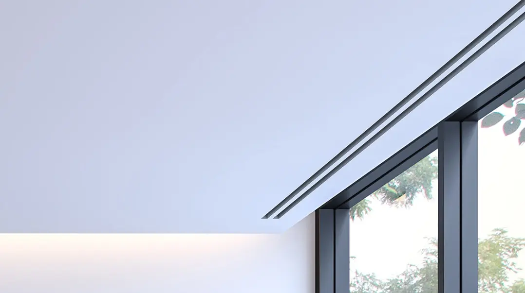 Photo showing seamless linear slot diffuser next to window